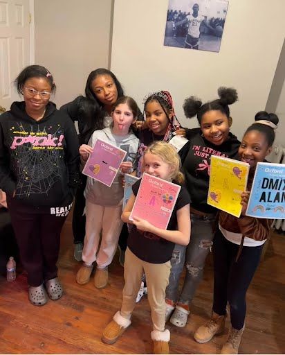 Group with educational materials